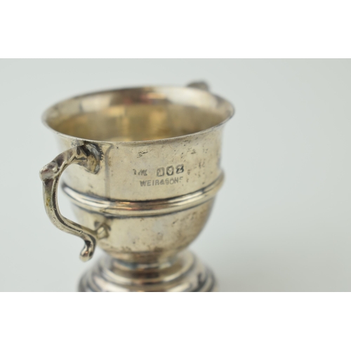 653 - Silver miniature two handled trophy, 61.8g, Dublin hallmark, stamped Weir & Sons.