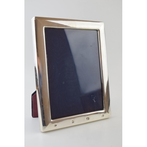 658 - Large silver photo frame, easel back, 22.5cm tall, Sheffield 1990.