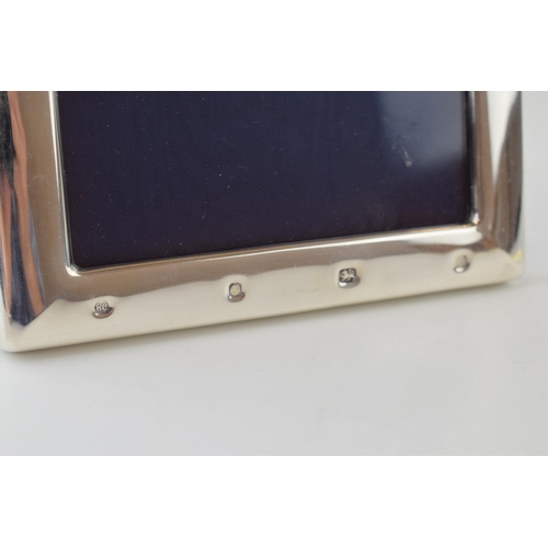 658 - Large silver photo frame, easel back, 22.5cm tall, Sheffield 1990.