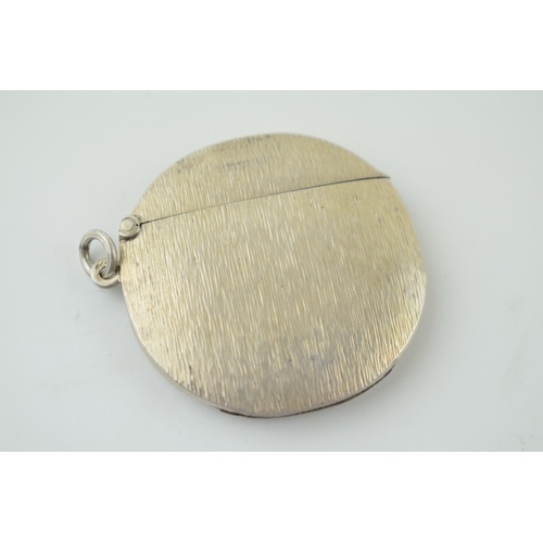 659 - Unusual silver round vesta case with bark effect design, 16.7g.