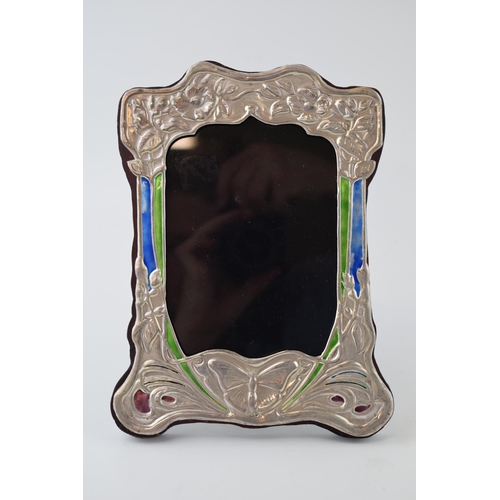 661 - Sterling silver fronted photo frame with enamelled decoration in the Art Nouveau style, easel back, ... 