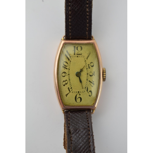 668 - 9ct gold cased manual wristwatch, leather strap, 19mm wide, non-working.