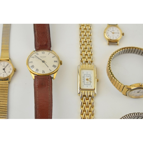 669 - A collection of wristwatches to include an early to mid 20th century manual wristwatch and later wat... 