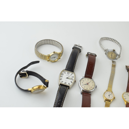 669 - A collection of wristwatches to include an early to mid 20th century manual wristwatch and later wat... 