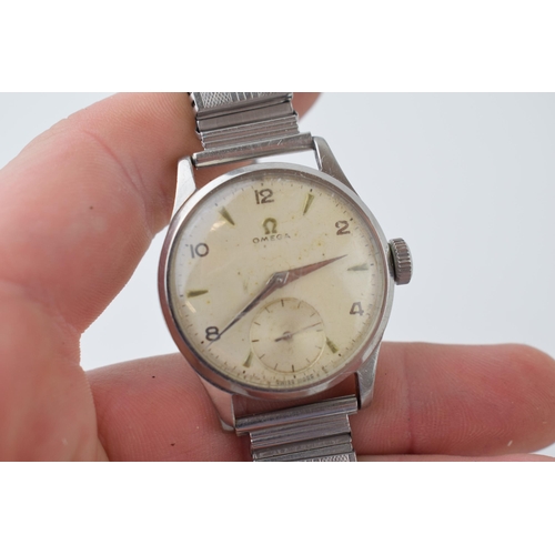670 - Omega gentleman's manual wristwatch watch, steel case, on  associated expanding strap, 32/33mm, non-... 