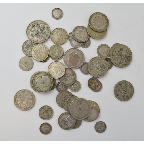 688 - A collection of 1920-1946 silver coins to include a 1921 One Florin piece and others, 233.5g.