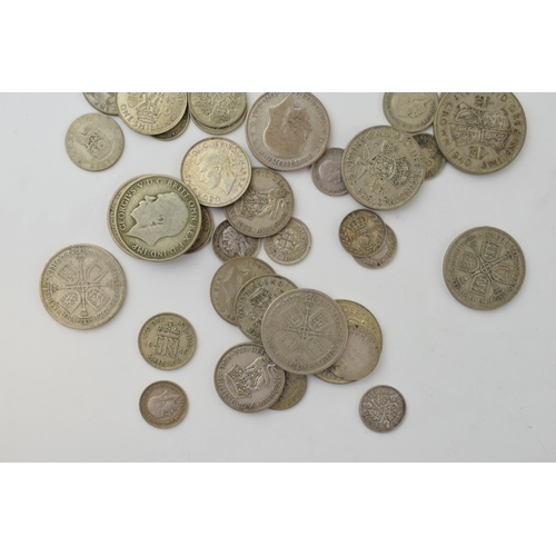 688 - A collection of 1920-1946 silver coins to include a 1921 One Florin piece and others, 233.5g.