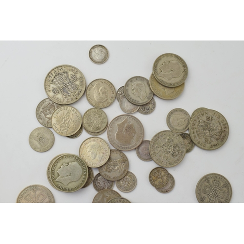 688 - A collection of 1920-1946 silver coins to include a 1921 One Florin piece and others, 233.5g.