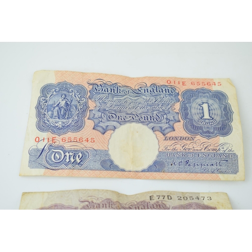 690 - Old UK bank notes to include a blue £1 note, 10 shillings notes, 10+ green £1 notes and foreign curr... 