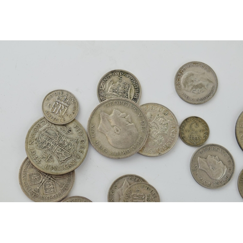 692 - A collection of pre-1947 silver coinage of varying denominations, 131.3g.