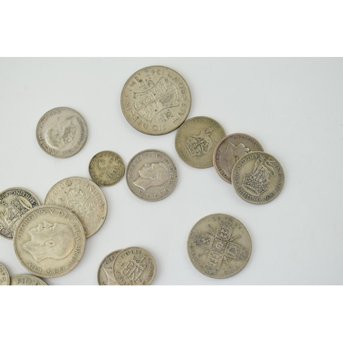 692 - A collection of pre-1947 silver coinage of varying denominations, 131.3g.