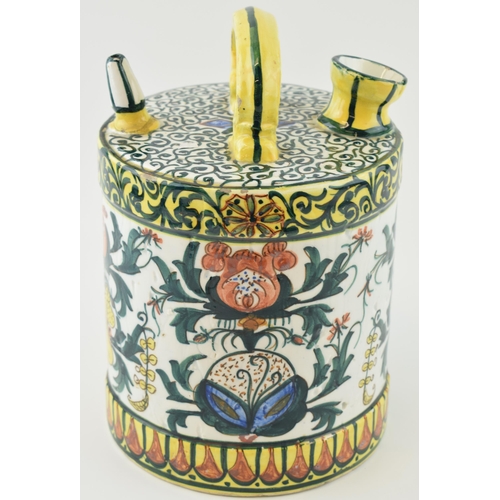 105 - Continental ceramic hand painted vessel with single handle of cylinder form, 26cm tall.