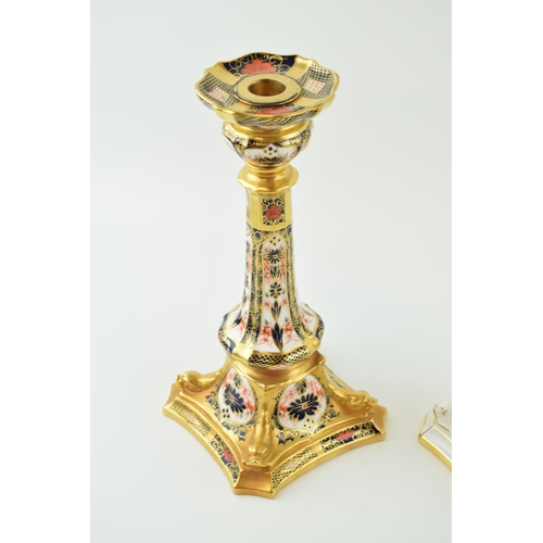 123 - A Royal Crown Derby 1128 Imari tall candlestick, 27cm tall, with a similar Olde Avesbury example (bo... 