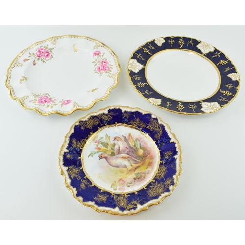 127 - Royal Crown Derby to include a large 27cm shared edge cabinet plate in the Royal Pinxton Roses desig... 