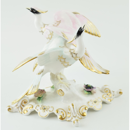 131 - Royal Crown Derby figural tableau of 'Chelsea Birds', 20cm wide (minor af).