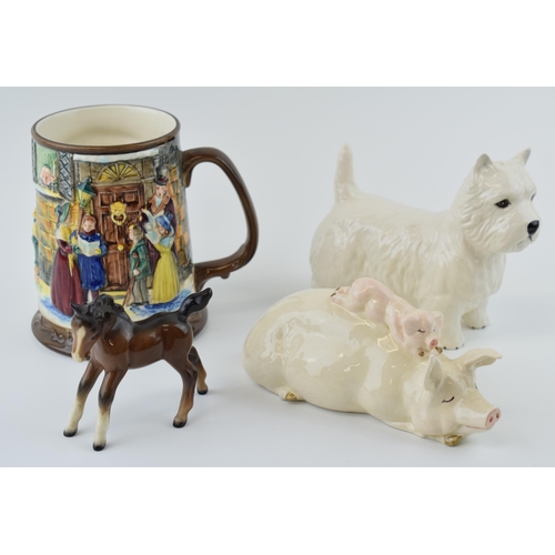 17 - Beswick Westie Dog with a piggy back figure, a brown foal and a Beswick tankard (4).