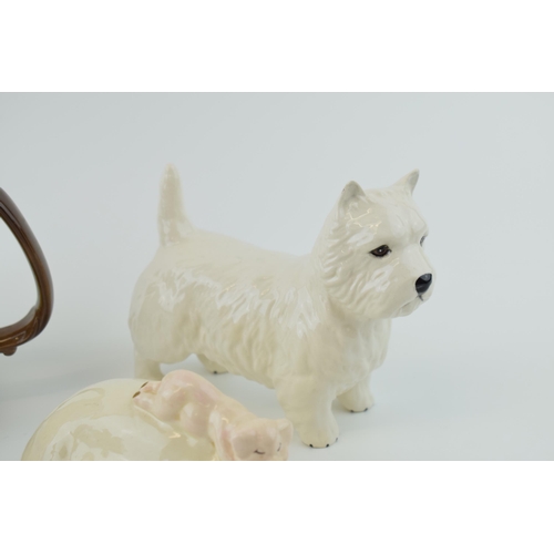 17 - Beswick Westie Dog with a piggy back figure, a brown foal and a Beswick tankard (4).