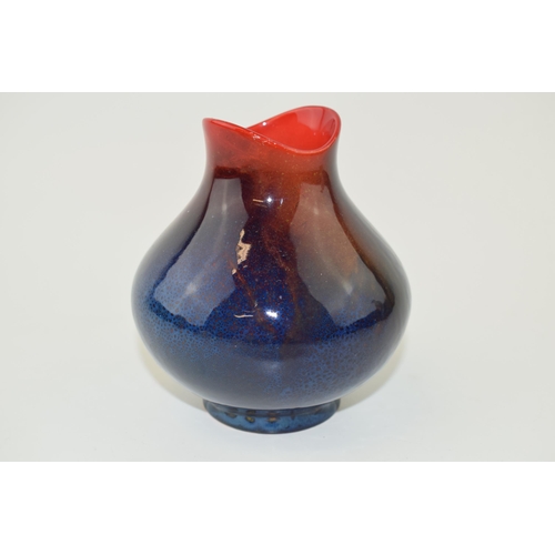 181 - Royal Doulton Flambe vase with rich colours, 11cm tall.