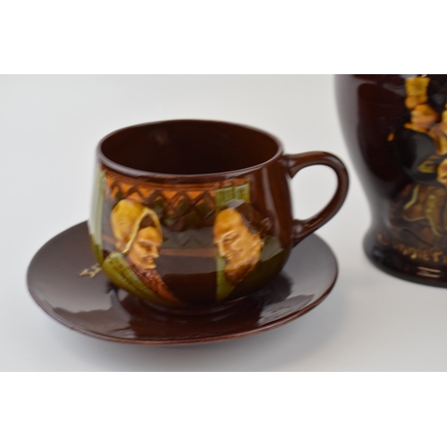 182 - Royal Doulton Kingsware to include a Prince Charlie flagon with a witch cup and saucer with a simila... 