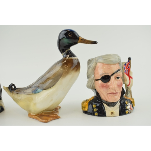 194 - Royal Doulton small character jugs to include Nelson D6963, the Wizard D6909 and a mallard duck  (af... 