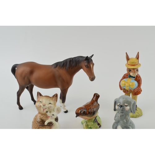 24 - Beswick to include Dog Praying 2130, Laughing Cat and Mouse 2100, a bird, a matt brown horse and a D... 