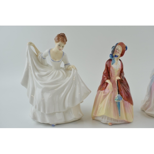 242 - Royal Doulton figures to include Charlotte HN2423, Paisley Shawl HN1988 and Pamela HN2479 (3).