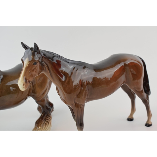 35 - Beswick to include a brown cantering shire, a brown imperial and a matte brown spirit (3).