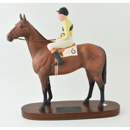 43 - Beswick model of Arkle with Pat Taaffe up, a Connoisseur Model, on wooden base.