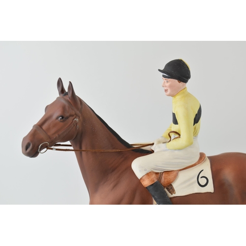 43 - Beswick model of Arkle with Pat Taaffe up, a Connoisseur Model, on wooden base.