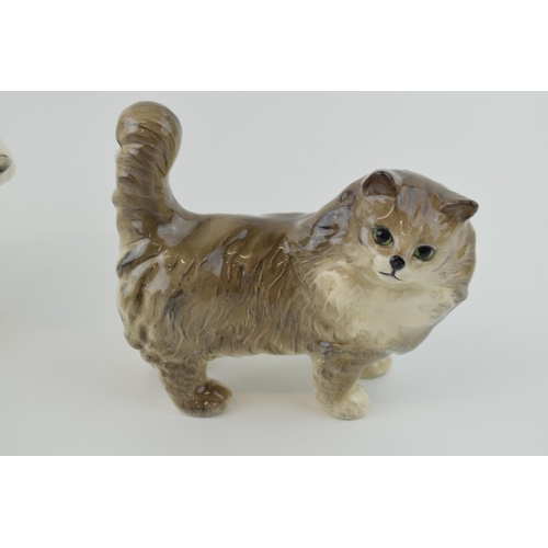 49 - Beswick to include a Scottie Dog 286, with a pair of Persian Cats 1898, one in grey and the other in... 