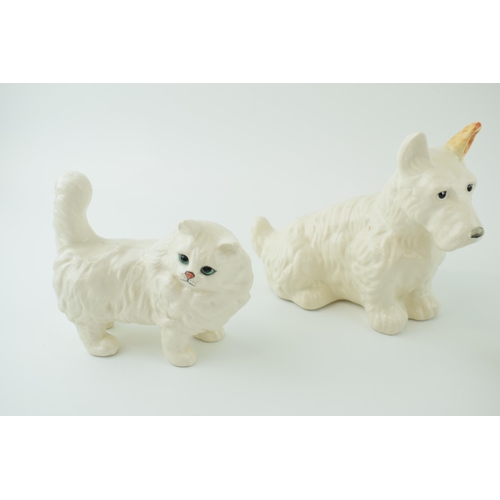 49 - Beswick to include a Scottie Dog 286, with a pair of Persian Cats 1898, one in grey and the other in... 