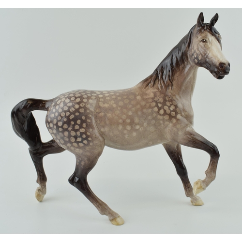 50 - Beswick Spirit of the Wind, with later outside factory decoration, in dappled grey / rocking horse g... 