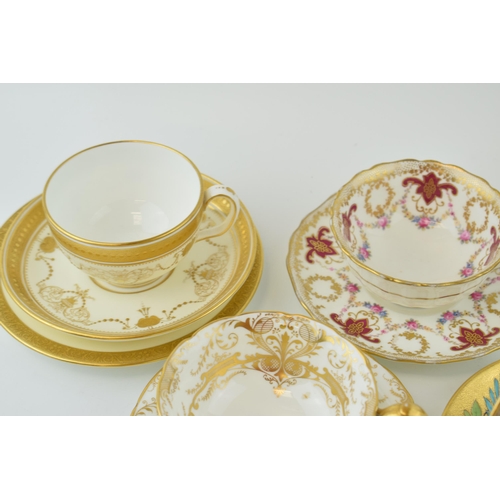 79 - A collection of tea cups and saucers to include a Minton Cabbage Rose / Pink Rose example, a Cauldon... 