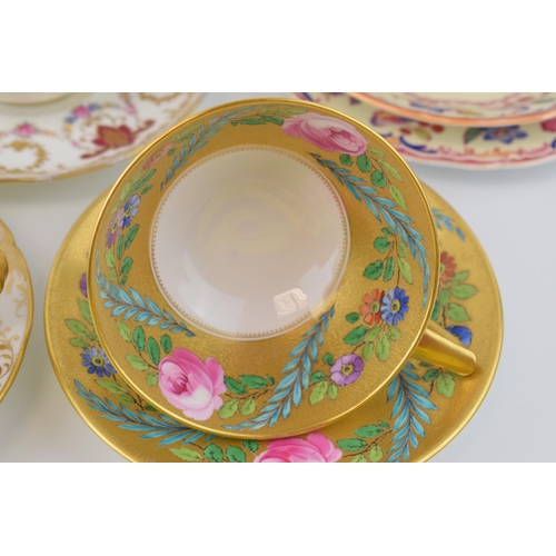 79 - A collection of tea cups and saucers to include a Minton Cabbage Rose / Pink Rose example, a Cauldon... 