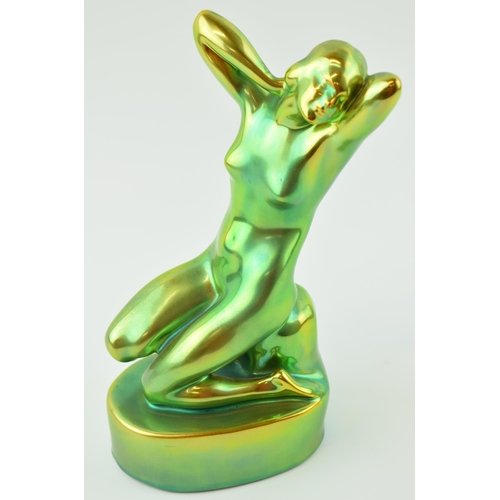 82 - Zsolnay Pecs Hungary model of a nude female figure, eosin green/gold lustre glaze, 25cm.