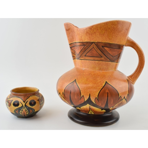 96 - Clewes and Co Chameleon ware large bulbous jug with a small vase (2), tallest 22cm.