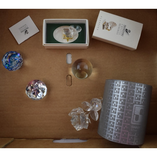 102 - Swarovski to include a large flower, a gramophone, 2 paperweights with a similar paperweight (5).