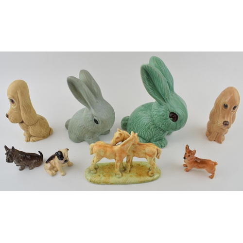 109 - A collection of Sylvac ceramic items to include dogs and rabbit together with a Sylvac style rabbit ... 