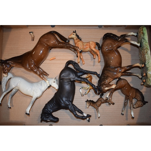 19 - A collection of damaged Beswick to include a grey Xayal, a mare and foal on base and others (Qty), c... 