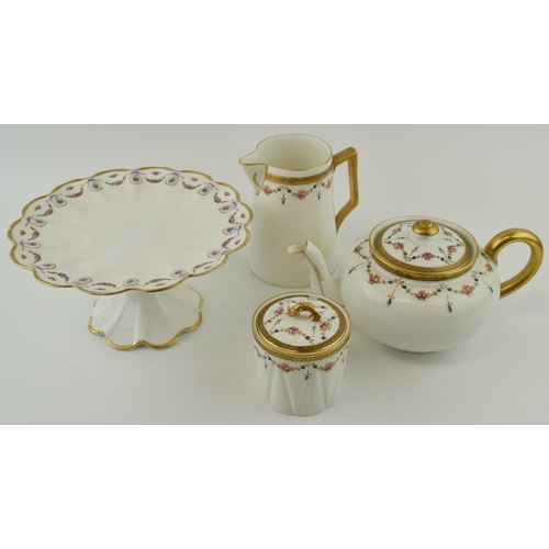 291 - Shelley China part tea set, decorated with floral patterns, with gilding, to include a teapot, a cre... 