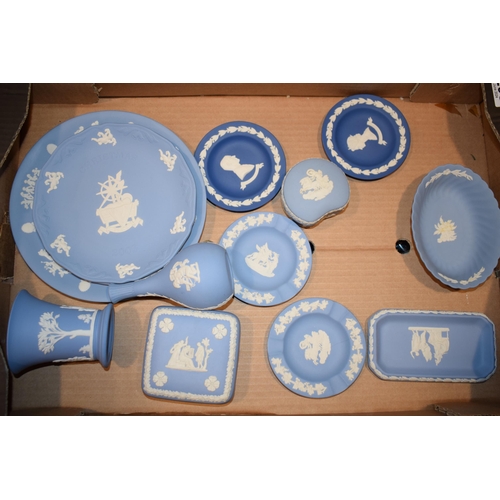 293 - A collection of Wedgwood Jasperware to include blue and commemorative pieces.