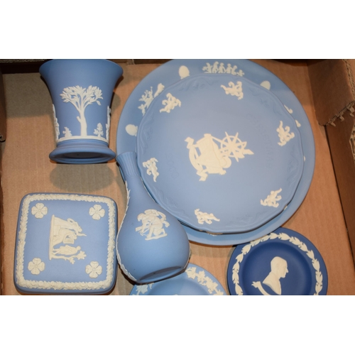 293 - A collection of Wedgwood Jasperware to include blue and commemorative pieces.