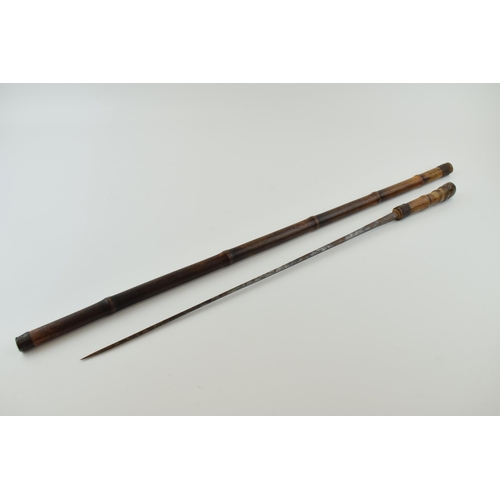 313 - Early 20th century bamboo cased swordstick, with indistinct marks to two sides of blade, 82cm long, ... 