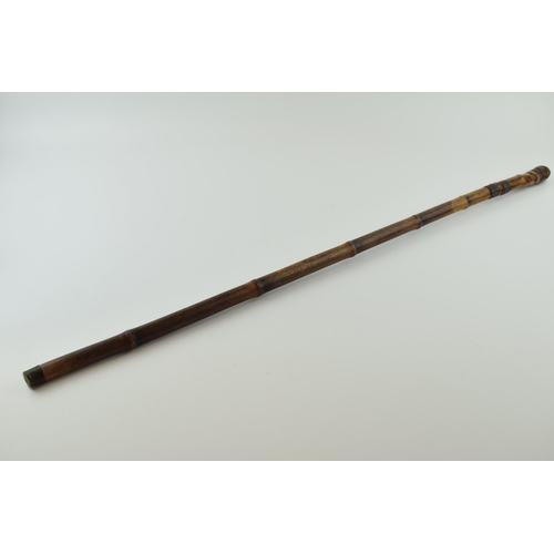 313 - Early 20th century bamboo cased swordstick, with indistinct marks to two sides of blade, 82cm long, ... 