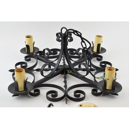 341 - Wrought Iron lamp fitting, vendor believed to have been made in Vienna - Metelgeschaft. 51cm x 20cm.