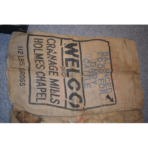 347 - A collection of vintage agriculural hessian sacks with 'Fish Meal', 'Pig Meal', Dairy Meal' and simi... 