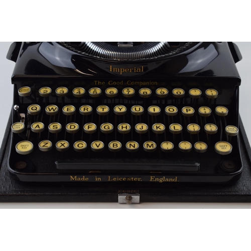 372 - An 'Imperial' portable typewriter 'The Good Companion' in original case. Made in Leicester. 29cm x 3... 