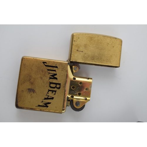 373 - A Guinness Zippo Lighter and Jim Beam Zippo with brass Tobacco Tin