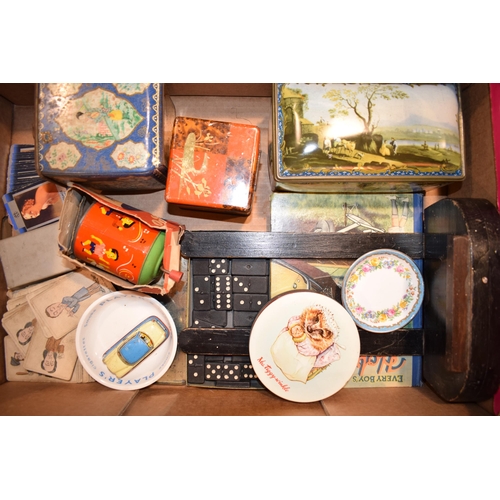 376 - A mixed collection of vintage items to include tin plate toys, advertising tins, cards, an antique p... 