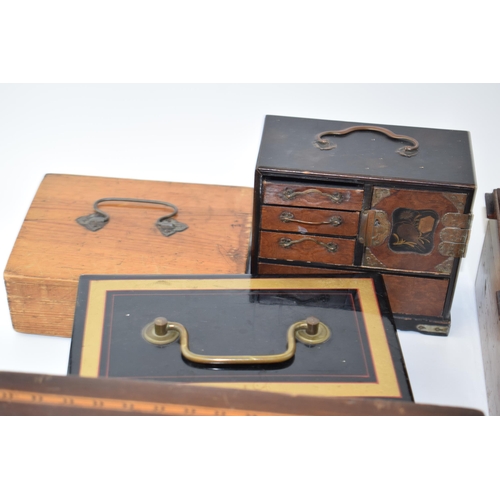 381 - A good collection of boxes and tins to include inlaid examples and others (Qty).